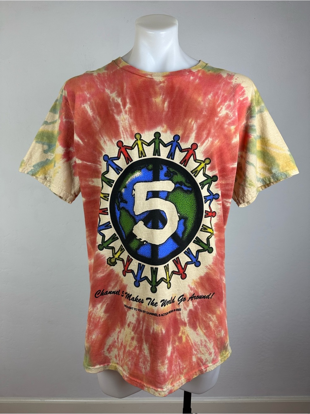 Channel 5 Action News Men’s Graphic “Makes the World Go Around” Tee